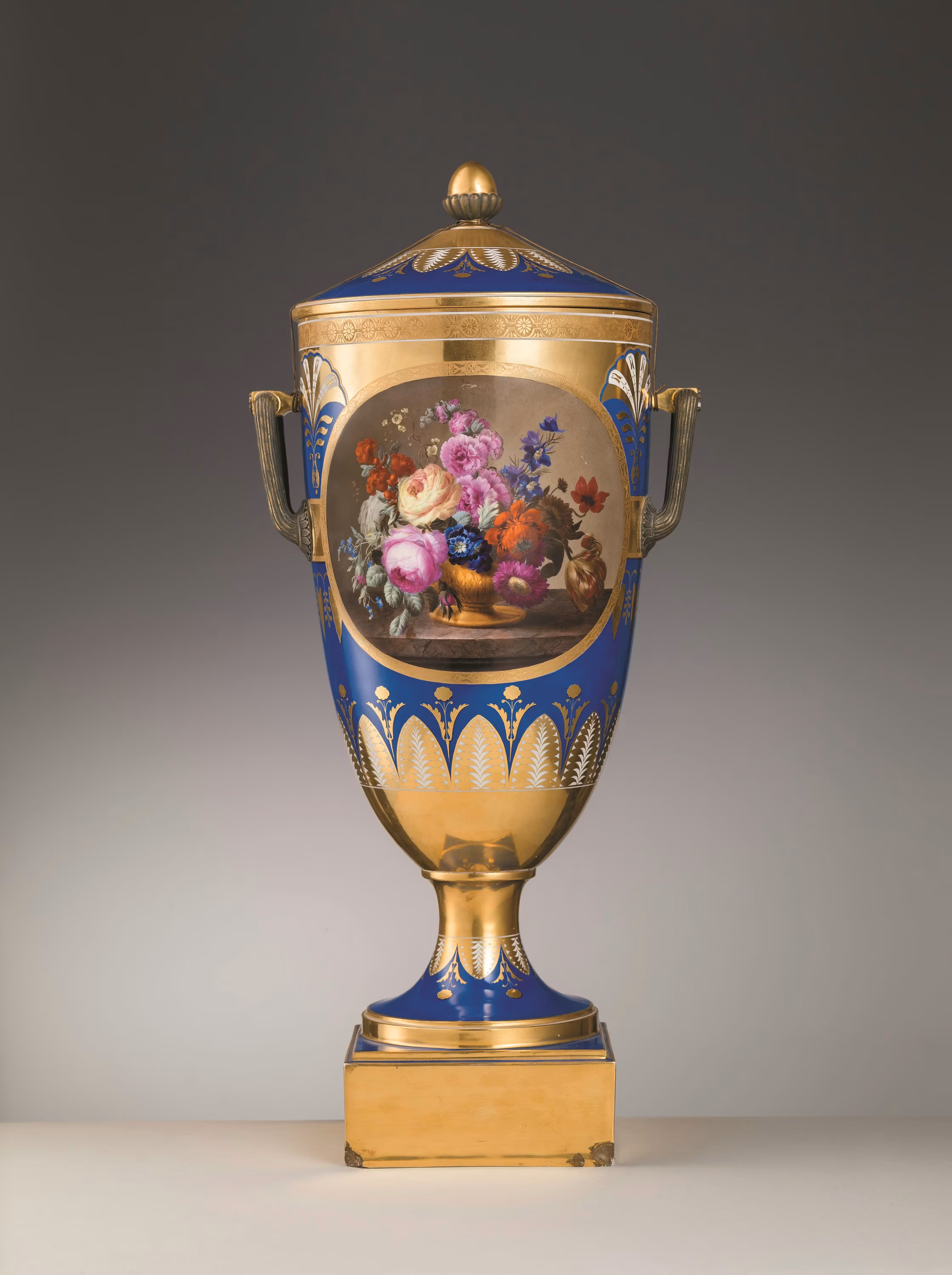 Pair of two-handled vases with lid